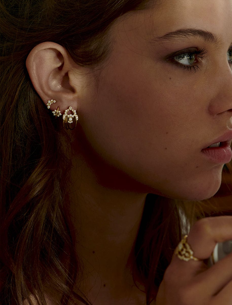 Nude Gold and diamonds piercing